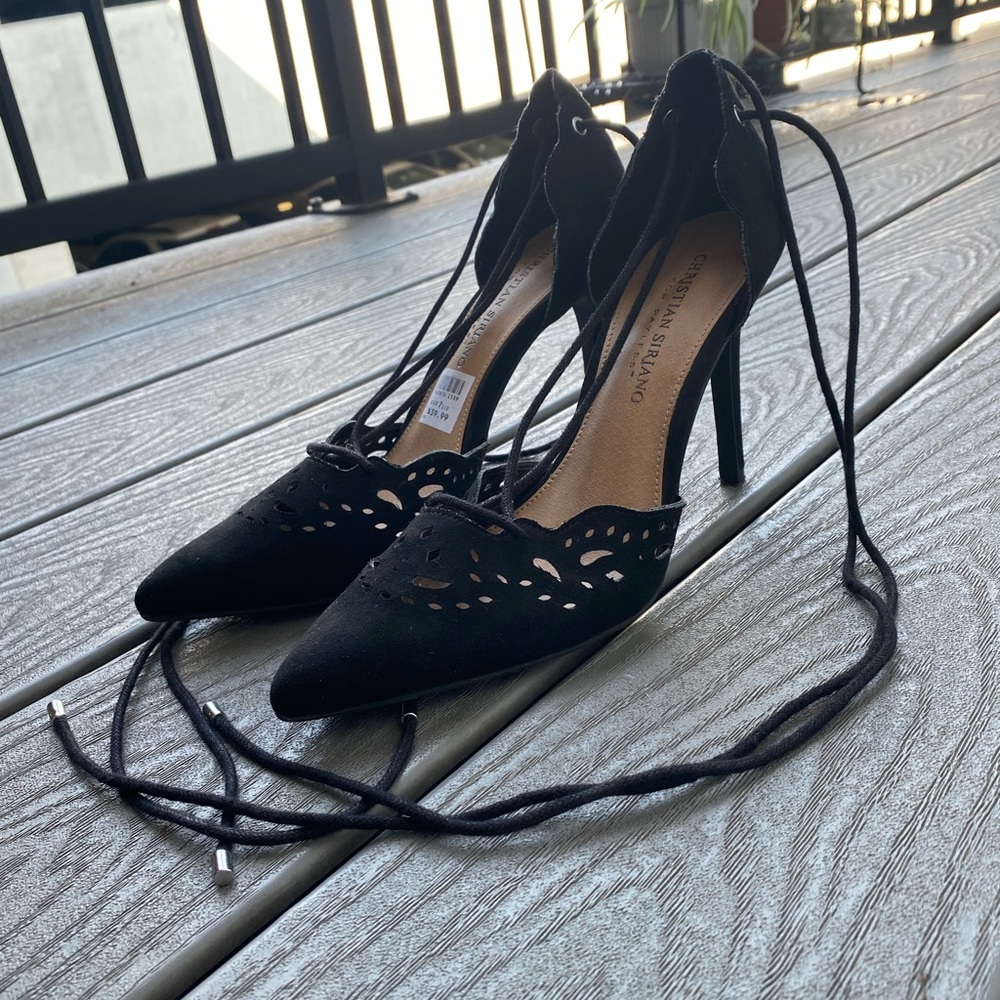 Black pointed toe heels with ties